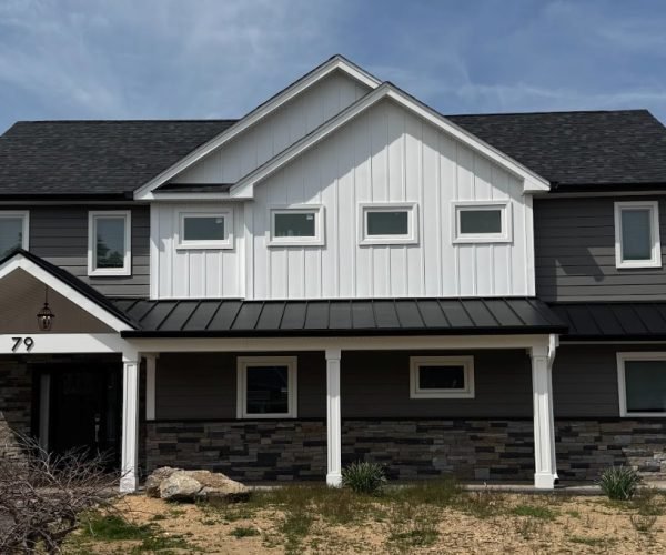 Professional siding installation on residential home
