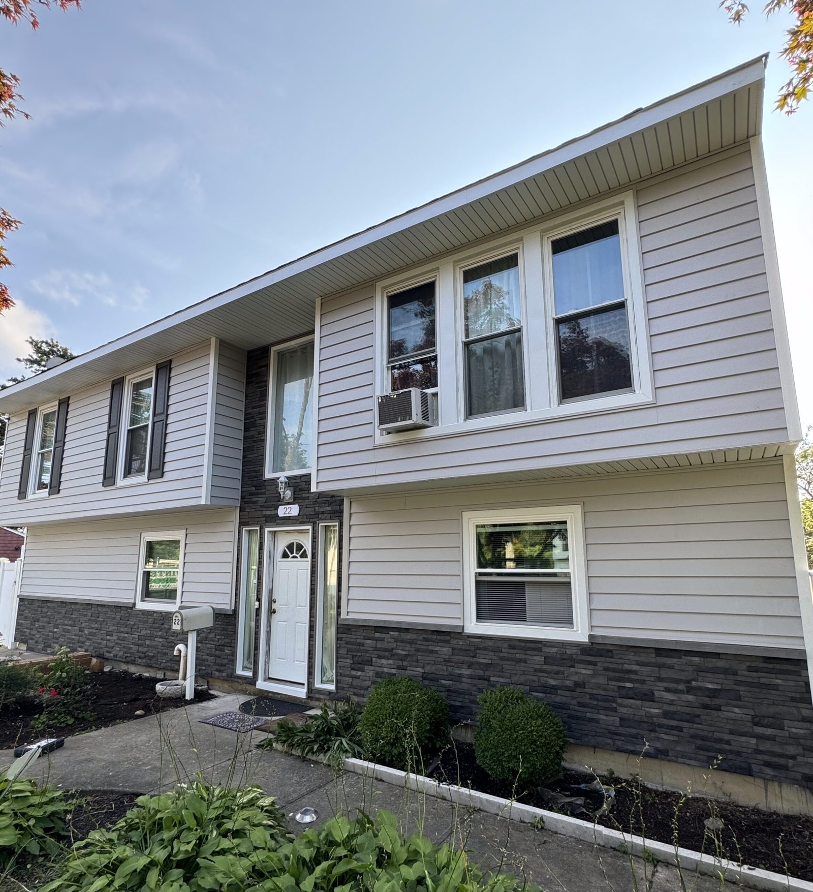 Professional siding installation on residential home