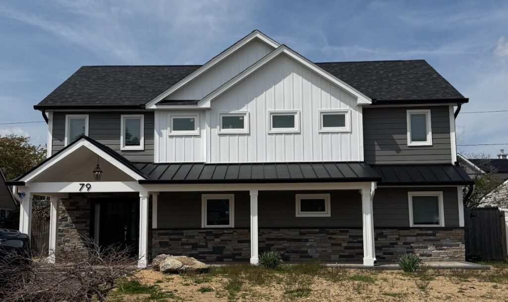 Professional siding installation on residential home