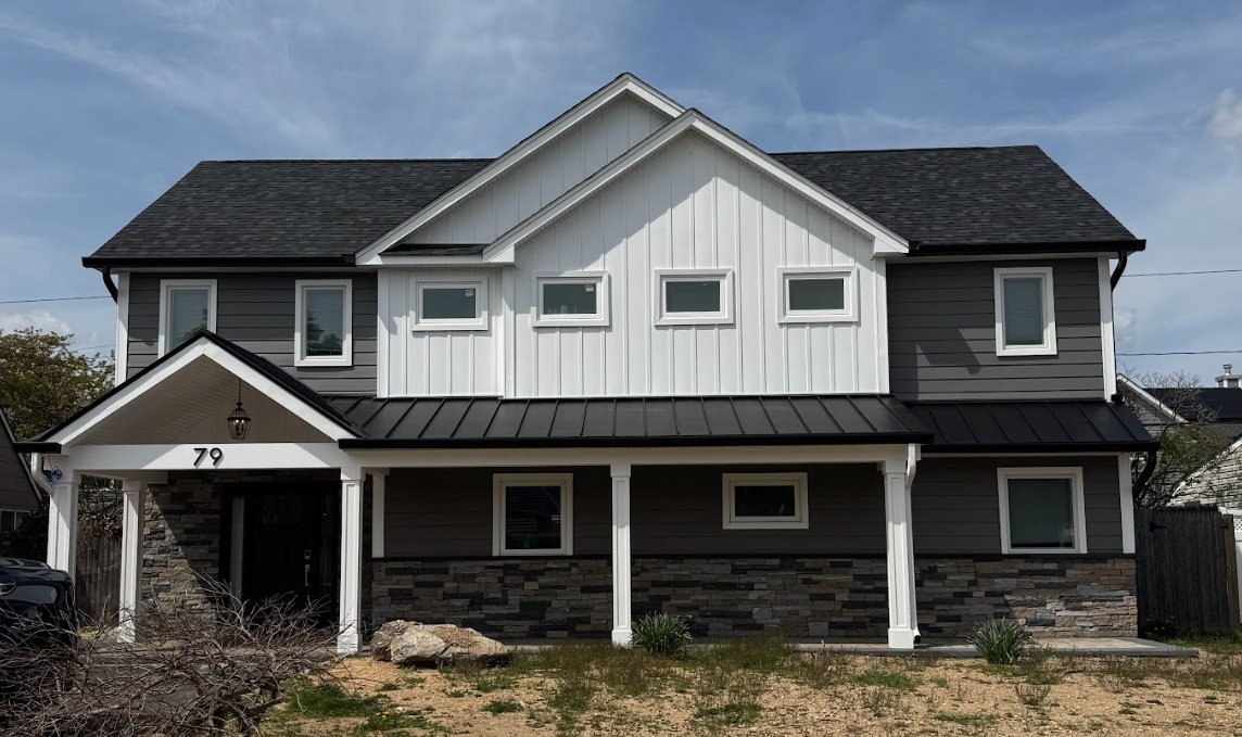 Professional siding installation on residential home